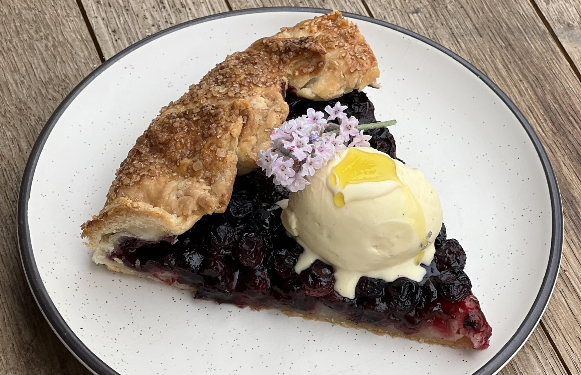 Lavender Olive Oil Custard aon a slice of blueberry galette, drizzled with Durant Lavender Fused Olive Oil on top