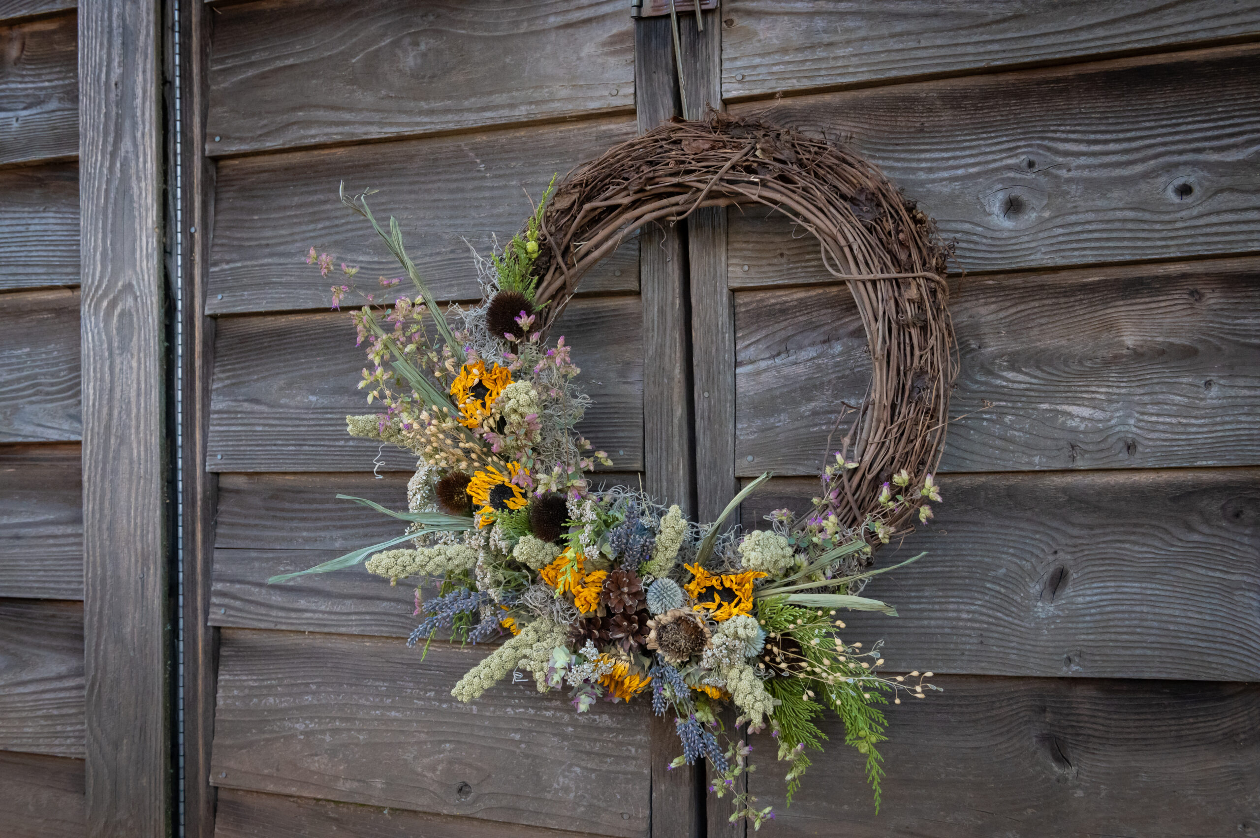 Durant Nursery Workshop - Autumnal dried wreath for the birds with an assortment of dried flowers with seeds for the birds to snack